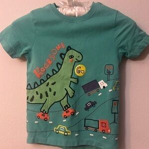 Nutmeg orange dinosaur t shirt size 5
100% cotton